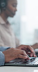 Hands, consultant or typing with laptop in call center office for customer service or support. Employees, agents or working on computer for online report, help or virtual assistance in contact agency
