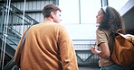 University, arrival or friends on stairs with bonding, friendly chat or planning of group project. Discussion, people or students with walking, peer connection or team update on college assignment.