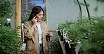 Woman, cannabis or phone call with plants in greenhouse for weed production or conversation. Female person, marijuana farmer or drug dealer talking with smartphone for natural growth or harvest stage