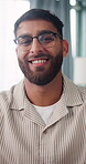 Face, glasses and laughing with man in home living room for humor, me time or weekend wellness. Eyewear, funny and relax with happy person in apartment for holiday, morning break or satisfaction