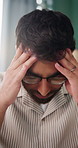 Headset, headache and man in home with stress for call center, crm or contact us with mistake. Remote work, mic and male technical support consultant with online error for customer service in house.