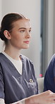Nurse, woman and listen in clinic with seminar, medical internship or thinking for workshop tips. Healthcare, intern and person in hospital with training meeting, knowledge or advice for development.