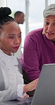 Women, talking and teamwork with laptop in office, budget review or financial planning with document. Business people, discussion and collaboration with info, typing and investment opportunity on web