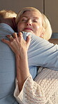 Love, couple and happy with hug in home for marriage appreciation, healthy relationship and bonding. Trust, mature people and smile with embrace for affection, connection and commitment for loyalty