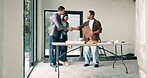 Couple, smile and handshake with interior designer in new house, discussion and planning for design. Happy people, shaking hands and decorator with clipboard, greeting and prepare for home renovation