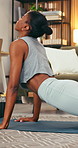 Balance, yoga and black woman in home for wellness, health and self care in morning for calm. Relax, stretching and African female person with pilates exercise for fitness in living room at house.