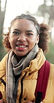 Face, hiker and smile with black woman outdoor in nature for adventure or wilderness hobby. Environment, experience and travel with person hiking in forest for fresh air, survival activity or trip