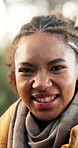 Face, hiking and smile with black woman outdoor in nature for adventure or wilderness hobby. Environment, experience and travel with happy hiker in forest for fresh air, survival activity or trip