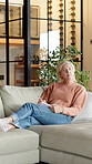 Diary, relax and writing with old woman on sofa in home living room for checklist or planning. Book, journal and schedule with thoughtful senior person in apartment for break, retirement or wellness