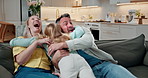 Excited, child and smile with parents in home for care, support or connection together on sofa. Girl, daughter and running with people in living room for family bonding, love and jumping with embrace