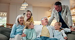 Smile, big family and relax with grandparents in home for care, support or generations connection. Children, granddaughter and embrace with senior people in living room for bonding, love and reunion
