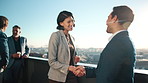 Business, greeting or people on balcony with handshake, partnership or negotiation in b2b deal. Networking, flare or employees at office with shaking hands, agreement or introduction in collaboration