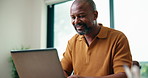 Laptop, remote work and smile of black man in home office for report, research or review. Computer, planning and typing with mature person in apartment for feedback or update as freelance employee