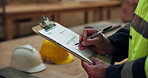Clipboard, inspection and hands with writing in warehouse for building or planning. Manufacturing, factory and person with checklist for workshop, safety and compliance for project maintenance