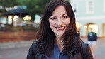 Happy, town and face of woman for tourism, commute and travel for holiday, vacation and abroad. Smile, outdoor and portrait of person in city for tourist experience, trip and explore on weekend