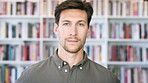 Publishing, office and face of man with books for career, opportunity and about us at agency. Creative, job and portrait of person by bookshelf for publicist, managing editor and publication house