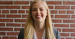 Face, funny and woman on brick wall, business and career development with recruitment consultant. Portrait, person and employee laugh with job opportunity, talent acquisition and hr professional