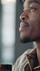 Relax, black man and thinking with coffee in restaurant for reflection, process decision or vision. Window, person and thoughtful with beverage in cafe for daydreaming, introspection or contemplating
