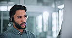 Headset, call center and businessman with computer in office for help desk, crm or online consultation. Mic, technology and male technical support agent with customer service on omnichannel system.