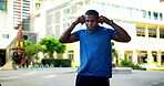 City, headphones or black man with smart watch for fitness, getting ready or select training playlist. Town, motivational podcast or runner with tech to start streaming, jog tracker or exercise music