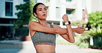 Woman, fitness and stretching with arms in city for workout preparation or outdoor exercise. Active, female person or getting ready with breathing or body warm up for start, begin or training in town