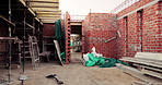 Construction, development and empty building, brick wall and concrete for engineering at site. Architecture, scaffolding and exterior with incomplete infrastructure, equipment and framework design