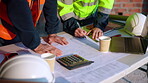 Team, hands and writing on blueprint for planning, measurement review and collaboration. Architect, people and floorplan at worksite for compliance, project adjustment and accuracy for development