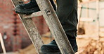 Shoes, construction worker and walking on ladder for building development, maintenance or renovation. Person, safety boots and climb at site for infrastructure, builder and industrial inspection