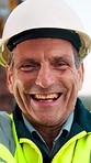 Face, engineer and man laugh at construction site, safety inspector and mature professional. Portrait, architect and funny person with helmet for building, infrastructure worker and experience