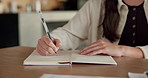 Hands, book and writing with remote work from home for schedule, checklist or agenda with review. Person, freelance job and notes for copywriting career, feedback or reminder with tasks at house