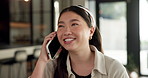 Asian woman, smile and phone call in home, freelancer and talk to client for advertising deal. Mobile, remote work and marketer in house, campaign feedback and negotiation for social media marketing