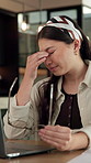 Eye strain, glasses or Asian woman in office with laptop, tired or headache pressure in prescription error. Screen fatigue, stress or employee with tech, migraine or vision issue with incorrect specs