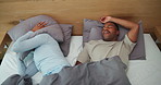 Above, wake up and couple in bed with snoring, loud sound or nasal congestion in home. Frustration, pillow and black man with woman for nap with sleep apnea, insomnia or noise for rest in bedroom.