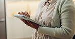 Tablet, scroll and hands of woman in home for streaming service, movie search and media app. Online film platform, subscription and series with person in house for connection and entertainment