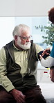 Hands, blood pressure and nurse with senior man in hospital with diagnosis, treatment or healthcare. Hypertension tool, consultation and medical worker with elderly patient for cardiology exam.