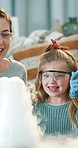 Mother, children and excited with science experiment in home for chemistry, bonding or child development. Woman, kids and scientific project in house with lab kit, equipment and learning for growth