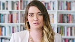 Serious, professor and face of woman in library for about us, course lecturer or knowledge. Education, academy researcher and bookshelf with person on campus for pride, teacher and university advisor