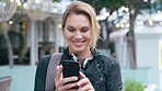 City, travel and woman with phone, message and texting with smile on social media and browsing chat. Outdoor, happy person and networking on mobile, scroll and communication with contact on website
