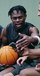 Phone, basketball and smile with men on court for streaming, score tracking and social media. Sports league leaderboard, entertainment and game broadcast with people and mobile for athlete search