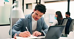 Businessman, writing and laptop in office with notebook, problem solving and data analysis for income. Coworking, person and notes with computer, graphs and statistics paperwork for revenue metrics.