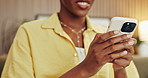 Cellphone, typing and hands of woman in home with networking, communication or texting on app. Technology, online and female person with phone for chatting, research or email in living room at house.