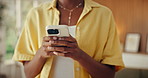 Phone, typing and hands of woman in home with networking, communication or texting in mobile app. Technology, walking and female person with cellphone for chatting, research or email in living room.