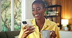 Black woman, coffee and phone in home with laughing for online joke, funny meme or humor on social media. Female person, mobile app or network with drinking tea at house, comedy website or ebook