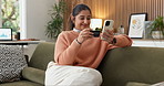 Phone, happy and woman on sofa with credit card, online shopping and purchase on website store. Smile, home and person on mobile app for digital banking, virtual payment and transaction for ecommerce