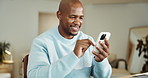 Phone, happy and black man in home with texting, chatting or social media on mobile app. Smile, technology and male person with cellphone for communication, networking or contact in apartment.