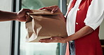Woman, customer and hands with door delivery for online shopping, package or logistics in home. Female person, courier guy or postal service with parcel, cargo or paper bag for ecommerce in house