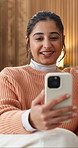 Phone, video call and woman on sofa in house with communication, greeting and online conversation. Happy, wave and female person with tech for virtual discussion with networking in living room