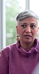 Comfort, talking and senior woman at group therapy for grief, sorrow or mourning with community support. Empathy, conversation and elderly female person in retirement at counseling session for loss.