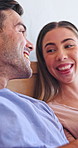 Couple, laugh and joke in bed with conversation, bonding together and funny story on weekend break. Happy, people dating and talk in home with humor, discussion and relax for connection in morning.
