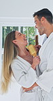 Love, karaoke or couple in bathroom with hairbrush, bonding or fun moment in morning routine. Laugh, man or woman in home with grooming, singing performance or playful dancing in romantic connection.